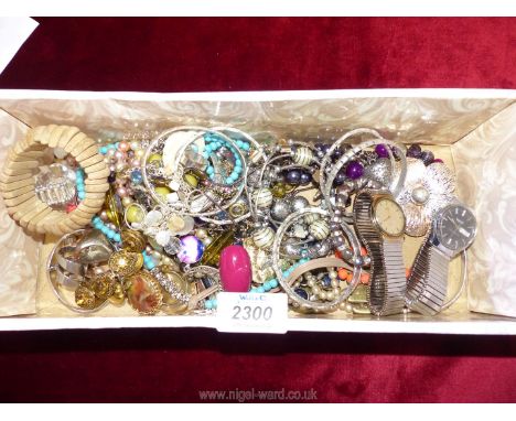 A quantity of miscellaneous jewellery including bangles, rings, necklaces and Timex Quartz gent's watch with expandable strap