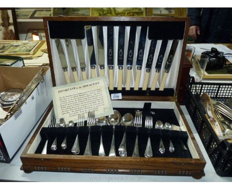 A Firth Staybright Canteen of Cutlery in dark wood box and with a wedding present letter for the item dated October 1939, in 
