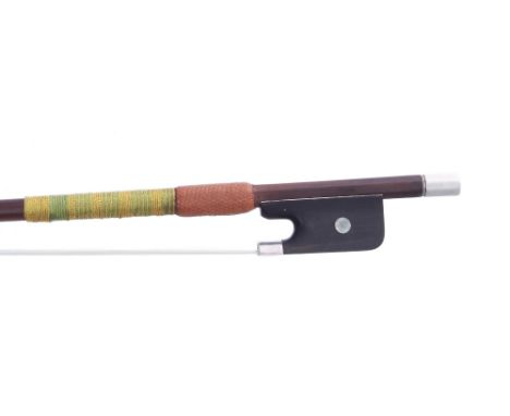 English silver mounted violin bow by W.E. Hill &amp; Sons stamped Hill, the stick round, the ebony frog inlaid with pearl eye