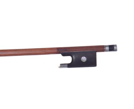 Silver mounted violin bow stamped Chanot, the stick round, the ebony frog inlaid with pearl eyes (one missing) and the ebony 