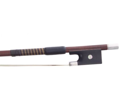 Fine English silver mounted violin bow by and stamped Jas Tubbs, the stick round, the ebony frog inlaid with pearl eyes and w