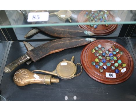 Circular Mahogany Solitaire board with assorted Marbles, Copper powder flask, Vintage Oil Can and a Kukri knife in scabbard