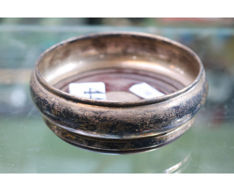 20thC Silver Wine Coaster with turned wooden base 