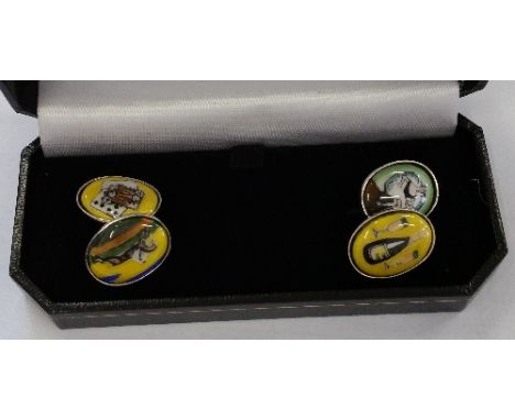 Four Silver Enamel Cufflinks. 