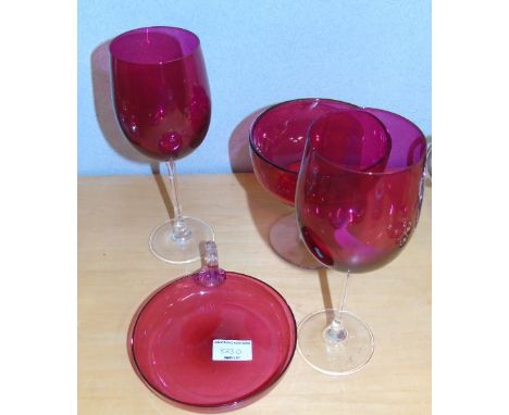 A Large Pair of Cranberry Glass Goblets, a night light holder and a Victorian cranberry pedestal bowl.