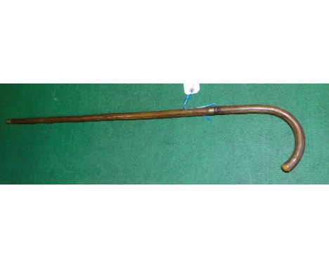 A 1920's Swordstick with Blue & Gilded Damascus Blade.