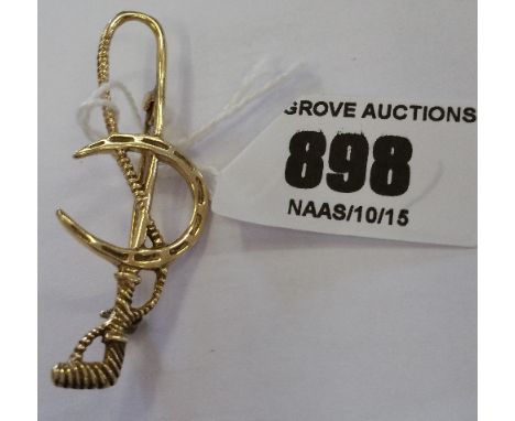 A Silver Hunting Brooch.