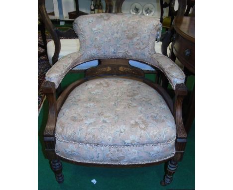 A Victorian Rosewood and String Inlaid Tub Chair; with pink tapestry style upholstery.