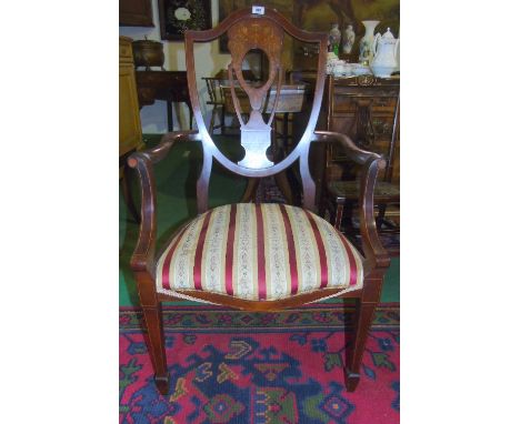 An Edwardian Mahogany & Inlaid Armchair with original tapestry fabric.