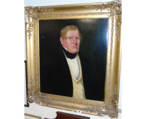 An Oil on Canvas English School Mid 19th Century Portrait of a Young Man; head and shoulders, with short red hair and a rosy 