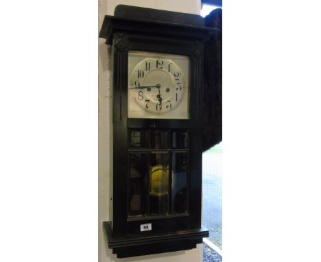A 1930's Ebonised Wall Clock.
