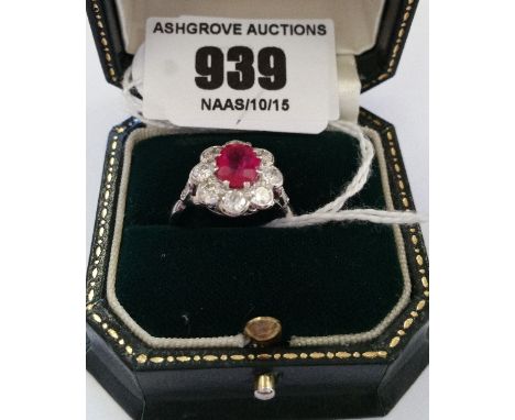 An 18ct Diamond Ruby Cluster Ring, Ruby 1 Carat In Weight And Diamond 1.6 Carat In Weight Approximately. 
