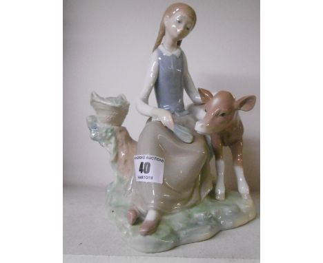 A Lladro Figure of a Girl Feeding a Calf.