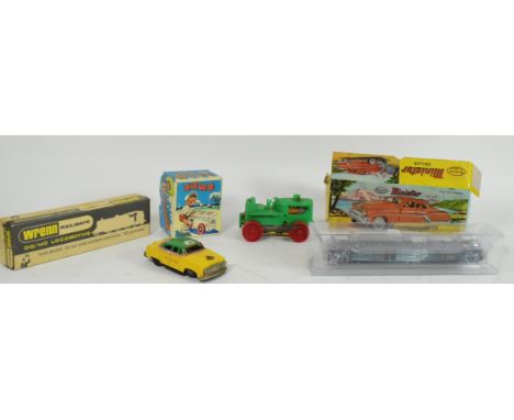 A collection of 20th century toys and models to include a Minister Deluxe car, Wren OO gauge locomotive, Japanese tin clockwo