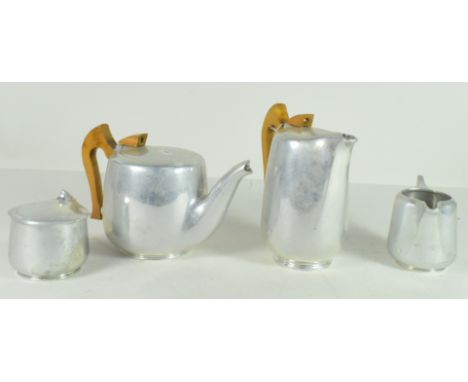 A mid century Piquot Ware, aluminium tea service comprising teapot, hot water pot (wooden handles to both pots), sugar bowl a
