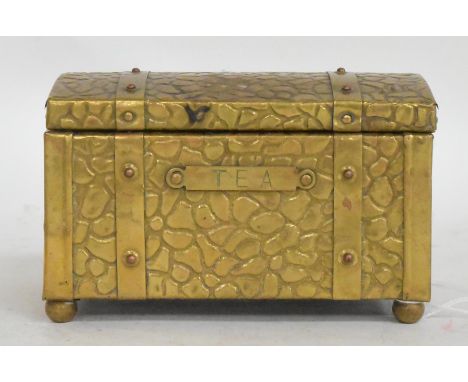 A 20th century brass Tea caddy casket in the manner of Joseph Sankey having reptile snakeskin effect o surface over bun feet.