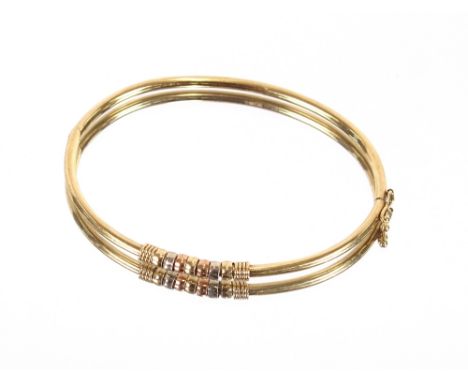 A 9 carat gold bangle; 5gms