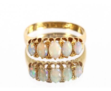 An 18 carat gold five stone opal ring