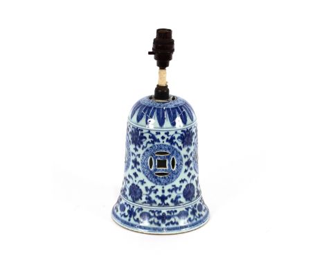 A Chinese blue and white table lamp base, having pierced symbol and floral decoration, 22cm high