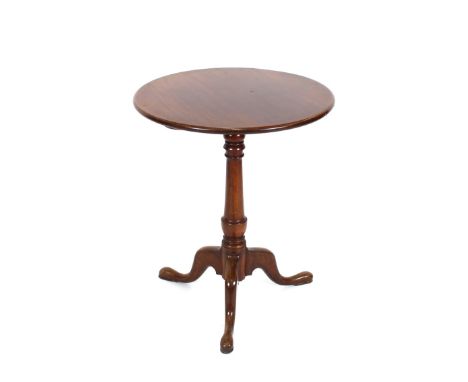 A 19th Century mahogany and elm occasional table, the circular top raised on a turned column and tripod base, 66cm dia.