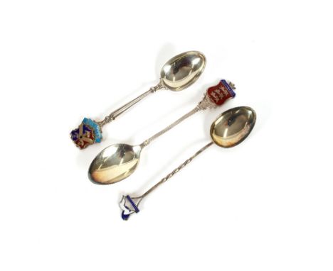 A silver and enamel souvenir spoon, commemorating Wembley 1924 and two others for Bradford and Guernsey, (3)