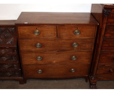 A Georgian mahogany chest, of two short and three long graduated drawers, raised on a shaped apron and bracket supports, 114c
