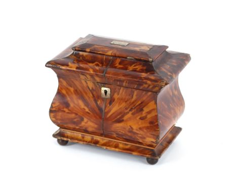 A Regency tortoise shell sarcophagus shaped tea caddy, 19cm wide x 18cm high