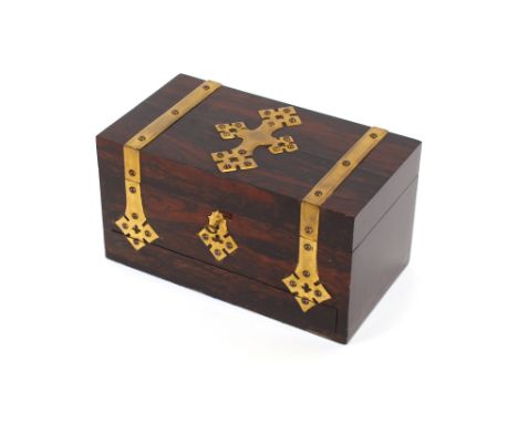 A 19th Century coromandel and brass mounted games box, containing bone chess pieces, brass mounted cribbage board, folding ba