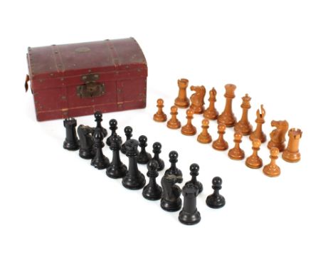 A Jacques type turned wooden chess set, contained in a folding miniature trunk