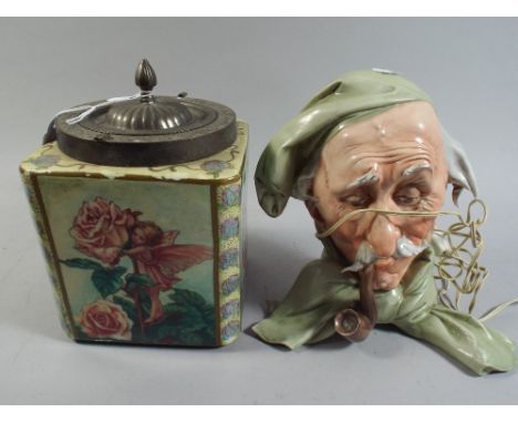 A Ceramic Biscuit Barrel Decorated with Fairies and A Novelty Night Light, Old Gent