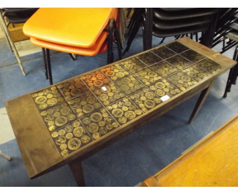 A Vintage Coffee Table with Coin Tile Motif 