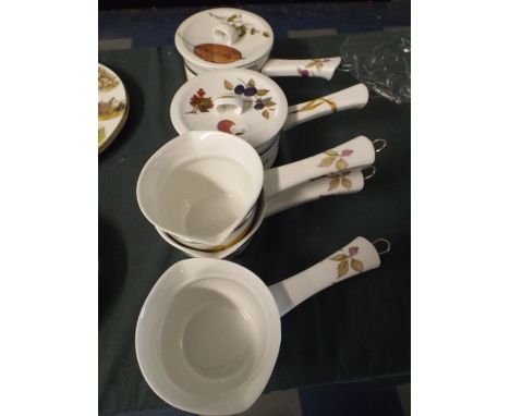 A Pair of Royal Worcester Evesham Saucepans and Three Milk Pans
