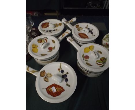 A Set of Four Royal Worcester Evesham Pattern Saucepans