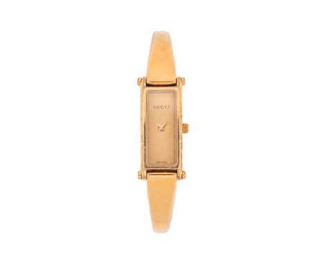 A Gucci gold-plated stainless steel lady's quartz wristwatchModel: 1500LSerial: 10317620Case Material: Stainless steelCase di