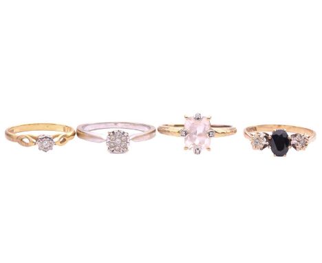 A collection of four gem set rings, including a sapphire and diamond three-stone ring, the sapphire measuring 7 x 5 x 3.6mm, 