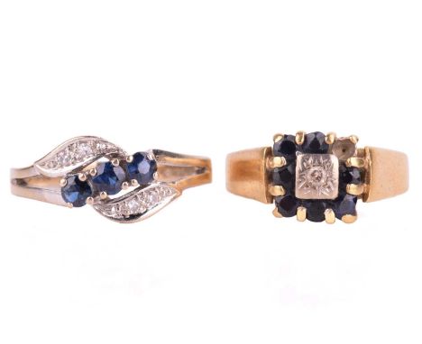 Two sapphire and diamond dress rings in 18ct gold; the first consists of three circular-cut sapphires between diamond-set cro