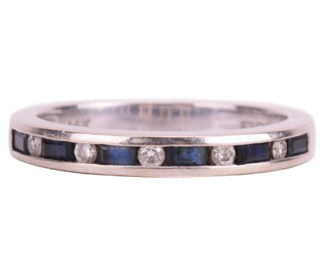 A sapphire and diamond half-eternity ring, alternating with baguette-cut sapphires and brilliant-cut diamonds in a channel se