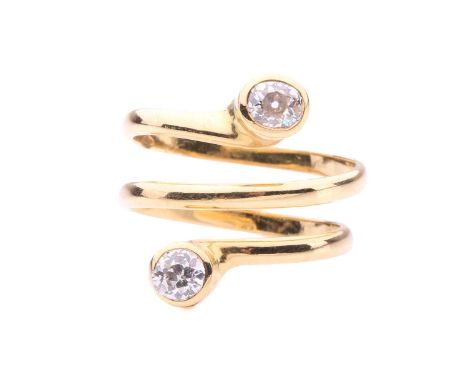 A diamond-set spiral ring, the wrap-around ring terminated with an old-cut diamond of 3.8 x 3.3 x 2.6 mm, and another measuri