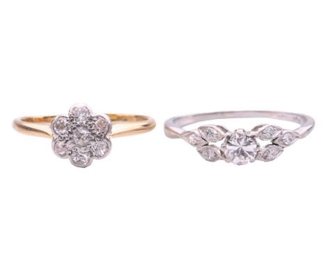 Two diamond rings; comprising a single stone diamond ring with diamond set foliate shoulders, the central diamond with an est