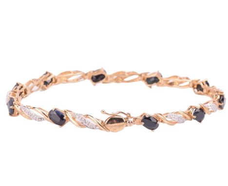 A sapphire and diamond line bracelet in 9ct gold, comprising a series of bi-coloured links of twisted design, embellished wit