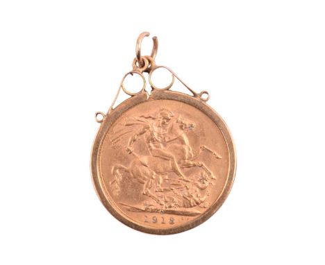 A George V full sovereign, 1913, in a 9ct yellow gold pendant mount with scrolled surmount, total weight of item 9.7 grams.
