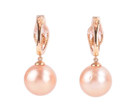 A pair of cultured pearl drop earrings, each featuring a 12.0 mm cultured Golden South Sea pearl, dangling from a hoop surmou