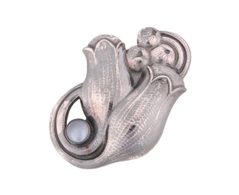 Georg Jensen - a tulip brooch set with moonstone, repoussé and chased in a stylised tulip spray form, collet set with a moons