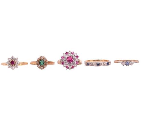 A collection of five gem set rings including a yellow metal three-stone bezel set diamond and sapphire ring stamped 9ct, size