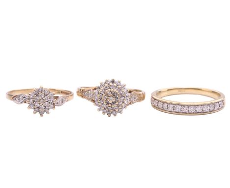 Three diamond rings, including a diamond half eternity ring set with round brilliant cut diamonds with a total estimated diam