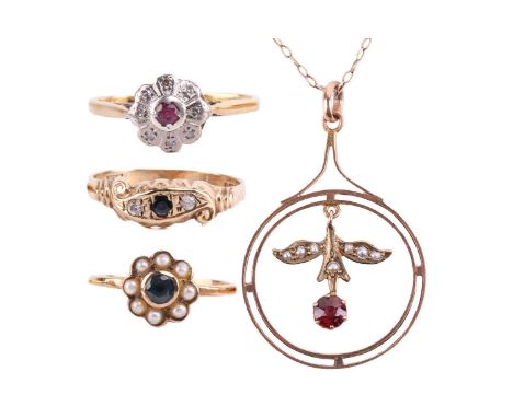 A collection of jewellery including a pendant and three rings; the pendant set with a garnet and seed pearls in a foliate des