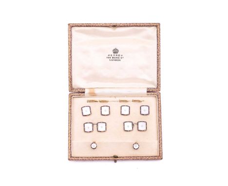 Asprey - a boxed dress set comprising dress studs, buttons and cufflinks, of bulged rectangular mother-of-pearl panels border