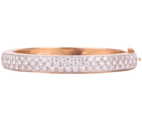 A diamond-set hinged bracelet, consisting of seventy brilliant-cut diamonds, with an estimated total weight of 4.86ct, pavé-s