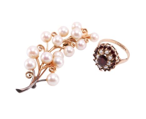 A garnet and seed pearl cluster ring with hallmarks for 9ct gold, ring size K 1/2, and a cultured pearl spray brooch measurin