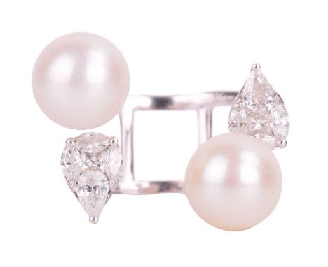 A cultured pearl and diamond open ring, comprising a wirework shank terminated with two round cultured pearls of 9.0 mm, and 